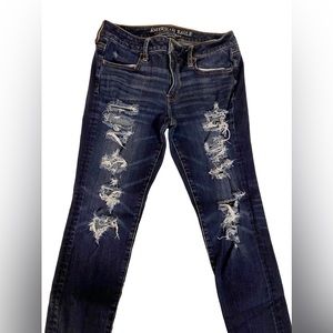 American Eagle distressed ripped dark wash stretchy jeans
